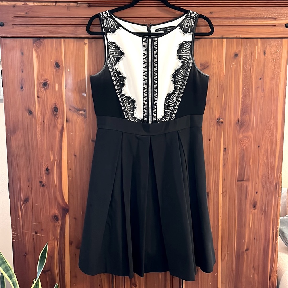 White House Black Market cocktail dress. Size 10 Black and White with lace trim.